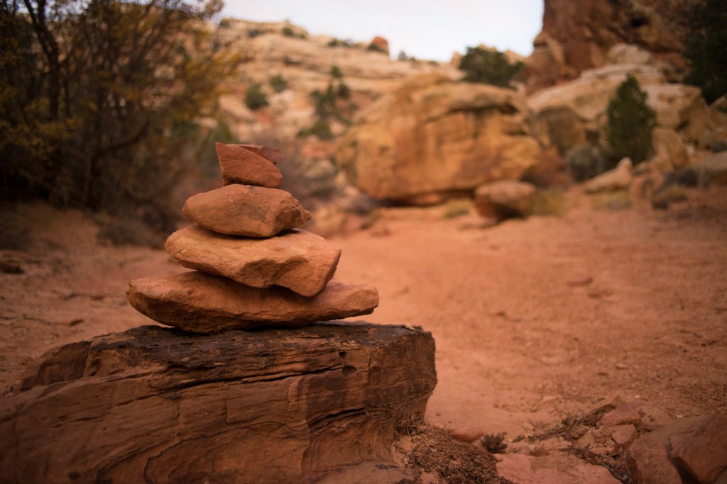 Kern Marking a trail in red rock.