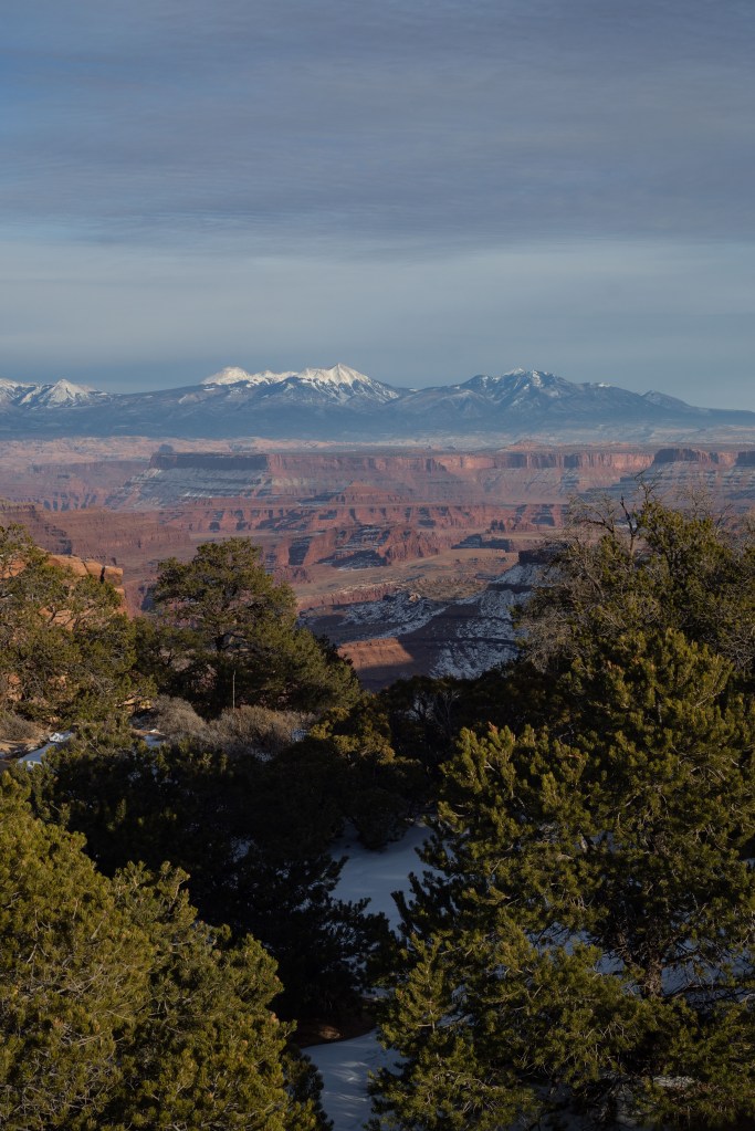 A view from the canyonlands overlook toward the Henry Mountains near dusk.